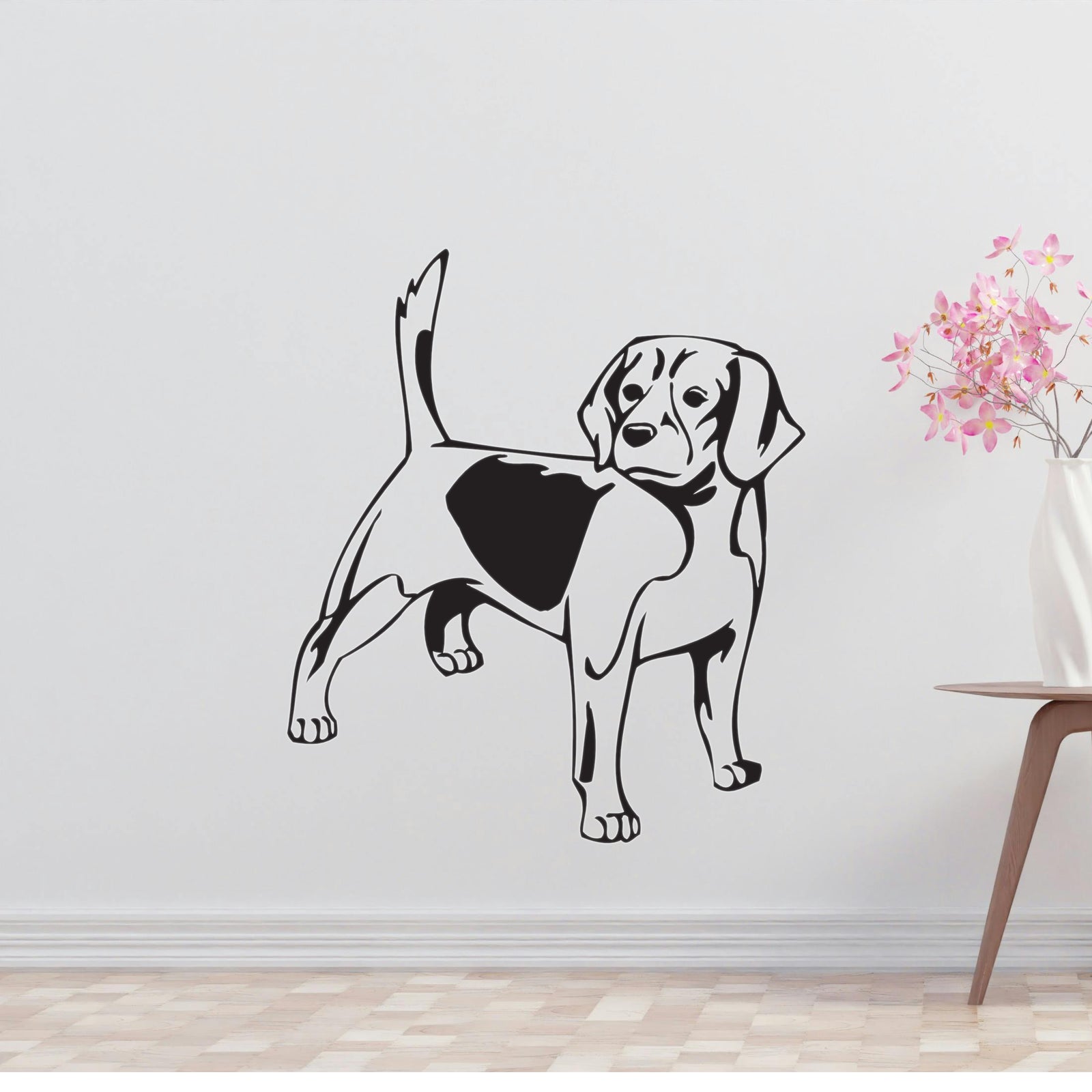 a black and white dog wall decal on a white wall