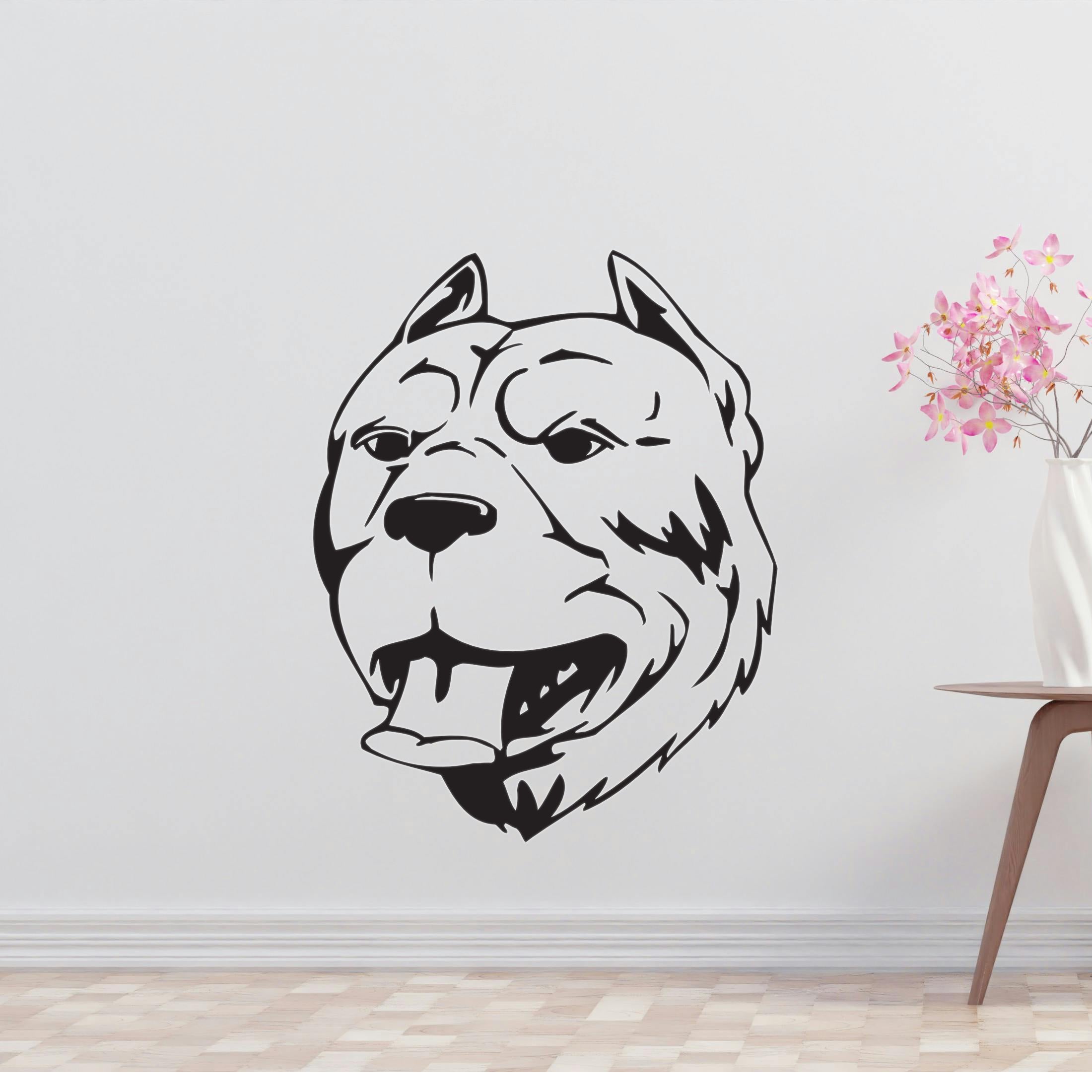 a dog's head is shown on a wall