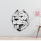 a dog's head is shown on a wall