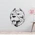 a dog's head is shown on a wall