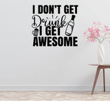 a wall with a humorous text sticker that reads "I DON'T GET Drink I GET AWESOME" along with an illustration of a beer bottle and a beer mug. There is also a small table with a vase of pink flowers in the background.