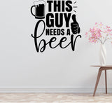 a wall decal with the text "THIS GUY NEEDS A BEER" along with a beer mug and a thumbs up symbol.