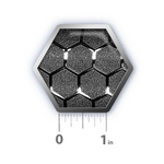 a hexagonal object with a ruler on it