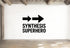 a white wall with a bold black text that reads "SYNTHESIS SUPERHERO" and two arrows pointing in opposite directions.