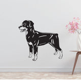 a black and white dog wall decal on a white wall