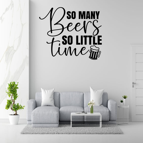 a living room with a gray sofa, a coffee table, and a potted plant. Above the sofa, there is a wall decoration that says 