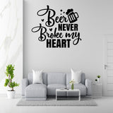 a wall decal with the text "Beer, Never Broke My Heart" in a stylized font.