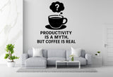 a wall decal with a coffee cup and thought bubble, accompanied by the text "Productivity is a myth, but coffee is real".