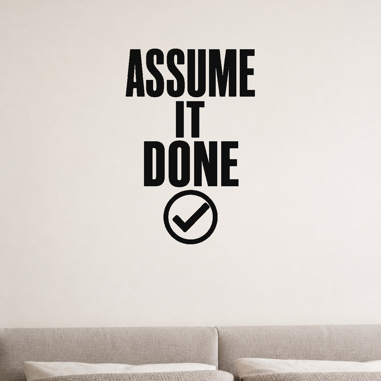 Assume It Done removable vinyl wall decal shown in a styled room.