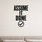 Assume It Done removable vinyl wall decal shown in a styled room.