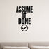 Assume It Done removable vinyl wall decal shown in a styled room.