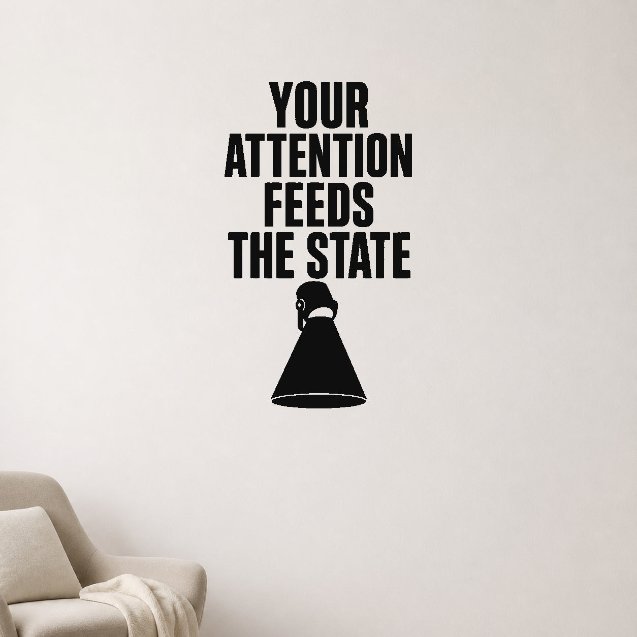 Alternate room view of the Your Attention Feeds the State removable vinyl wall decal.