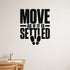 Move As If It Is Settled removable vinyl wall decal shown in a styled room.