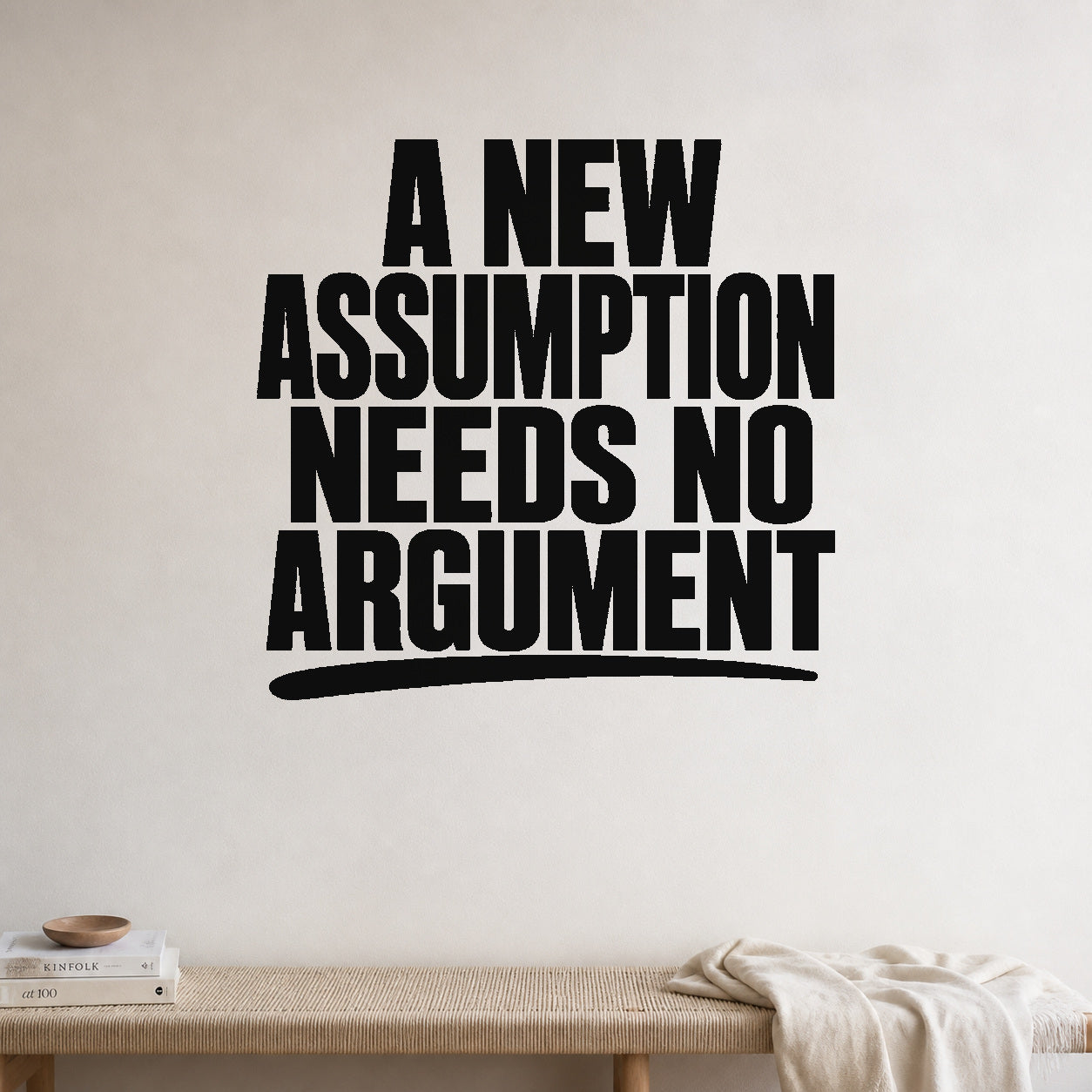 A New Assumption Needs No Argument removable vinyl wall decal shown in a styled room.