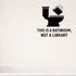 This is a Bathroom, Not a Library - Funny Bathroom Wall Decal Vinyl Sticker Removable shown as a removable vinyl wall decal in a second room setting
