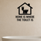 Home is Where the Toilet Is - Funny Bathroom Wall Decal Vinyl Sticker Removable shown as a removable vinyl wall decal in a category-appropriate room
