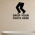 Drop Your Pants Here - Funny Bathroom Wall Decal Vinyl Sticker Removable shown as a removable vinyl wall decal in a category-appropriate room