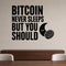 Bitcoin Never Sleeps But You Should removable vinyl wall decal shown in a styled room.