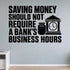 Saving Money Should Not Require a Bank's Business Hours removable vinyl wall decal shown in a styled room.