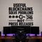 Useful Blockchains Solve Problems Not Press Releases removable vinyl wall decal shown in a styled room.