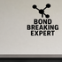 Bond Breaking Expert - Funny Chemistry Wall Decal Vinyl Sticker Removable shown as a removable vinyl wall decal in a category-appropriate room