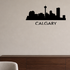 Cityscape Calgary Canada with Text Vinyl Decal Removable Matte Finish Skyline Decore for Indoor Walls shown as a removable vinyl wall decal in a category-appropriate room