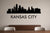 Kansas City skyline with text removable vinyl wall decal shown on a modern flat interior wall