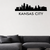 Cityscape Kansas City with Text Vinyl Decal Removable Matte Finish Skyline Decore for Indoor Walls shown as a removable vinyl wall decal in a category-appropriate room