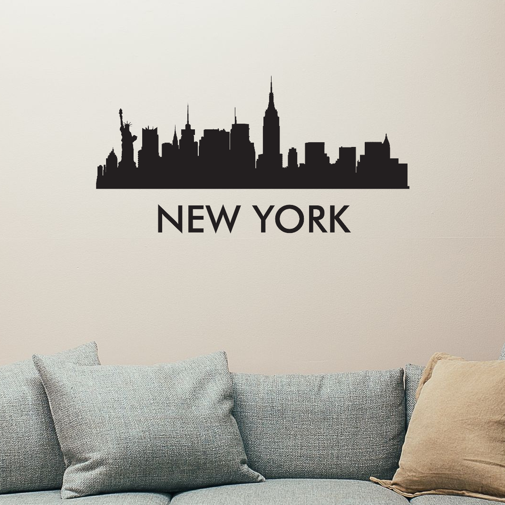 New York City skyline removable vinyl wall decal shown installed above a sofa in a living room