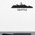 Seattle with text removable vinyl wall decal shown installed in a styled room