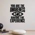 You Are the Awareness Having the Experience removable vinyl wall decal shown in a styled room.
