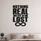Nothing Real Can Be Lost removable vinyl wall decal shown in a styled room.