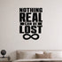 Nothing Real Can Be Lost removable vinyl wall decal shown in a styled room.