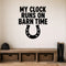 My Clock Runs on Barn Time removable vinyl wall decal shown in a styled room.
