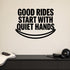 Good Rides Start with Quiet Hands removable vinyl wall decal shown in a styled room.