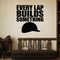 Every Lap Builds Something removable vinyl wall decal shown in a styled room.