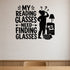 My Reading Glasses Need Finding Glasses removable vinyl wall decal shown in a styled room.