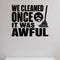 We Cleaned Once It Was Awful removable vinyl wall decal shown in a styled room.