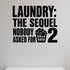 Laundry: the Sequel Nobody Asked for removable vinyl wall decal shown in a styled room.