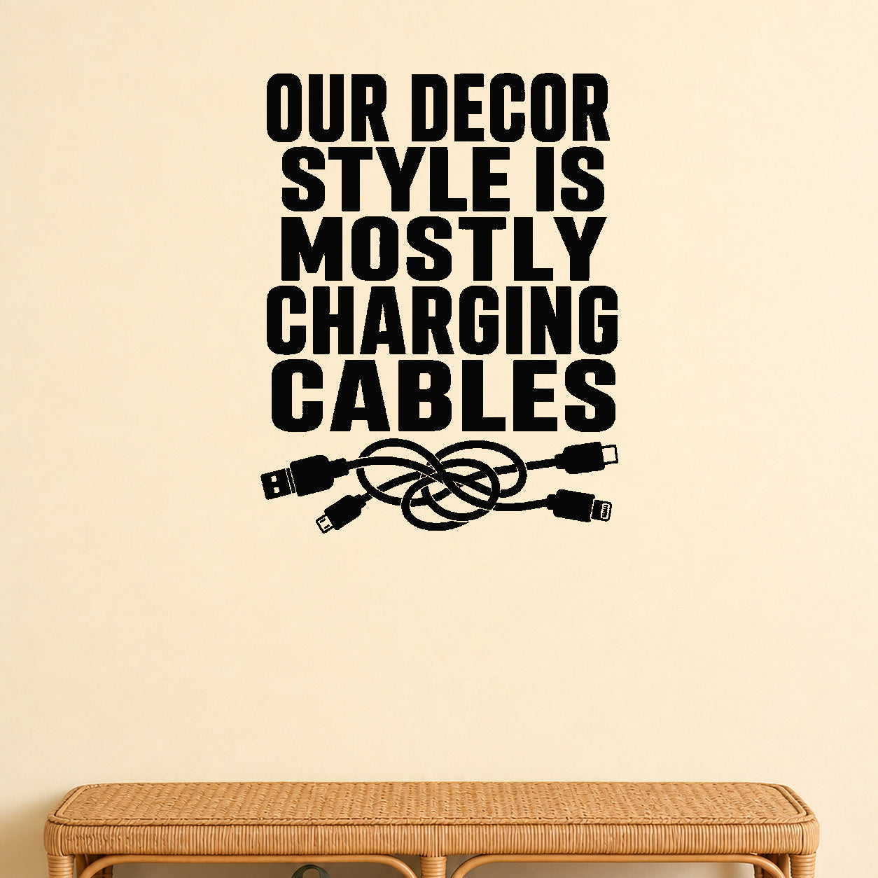Our Decor Style Is Mostly Charging Cables removable vinyl wall decal shown in a styled room.