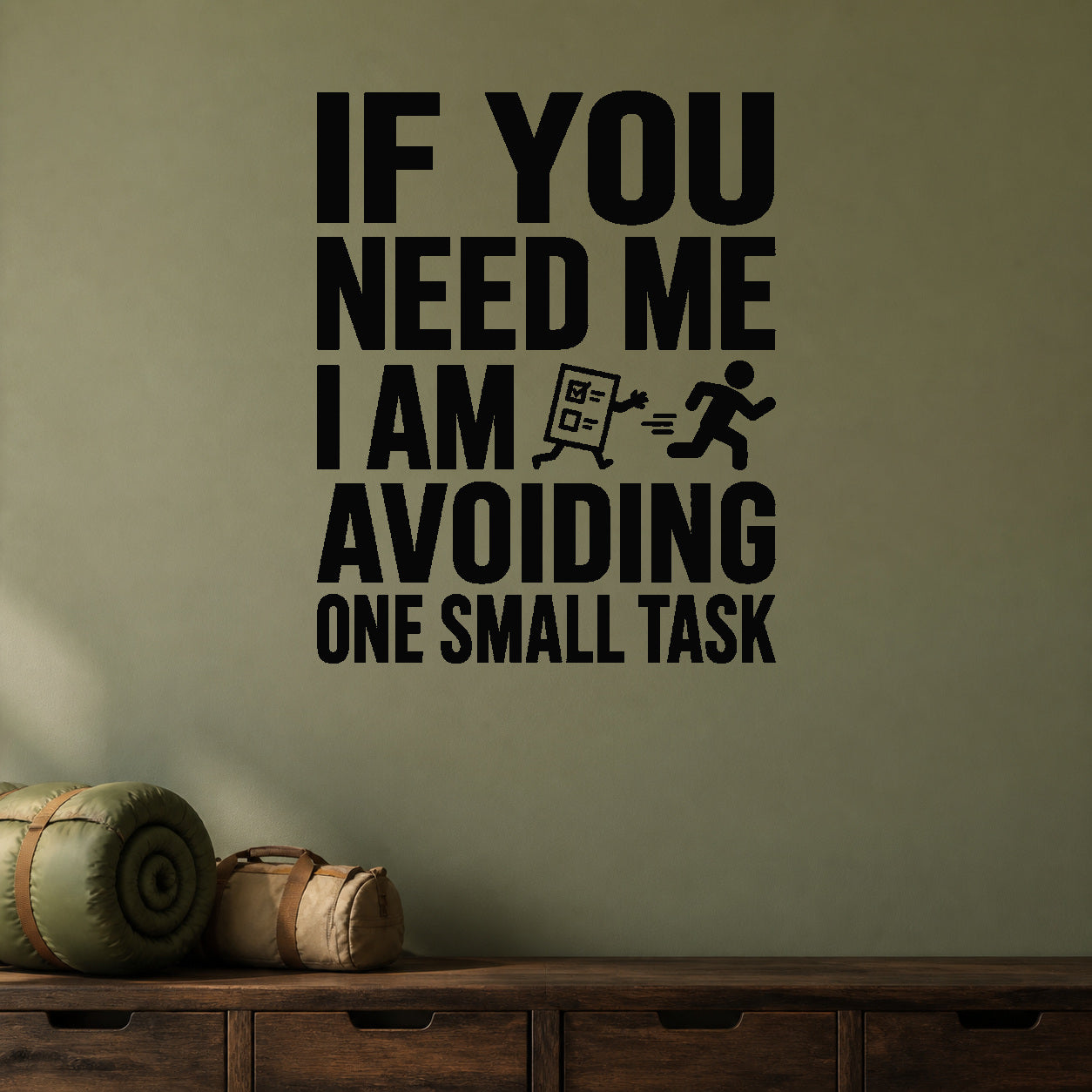 If You Need Me I Am Avoiding One Small Task removable vinyl wall decal shown in a styled room.