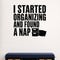 I Started Organizing and Found a Nap removable vinyl wall decal shown in a styled room.