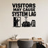 Alternate room view of the Visitors May Cause System Lag removable vinyl wall decal.