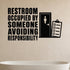 Restroom Occupied By Someone Avoiding Responsibility removable vinyl wall decal shown in a styled room.