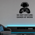 Do Not Disturb: Gamer At Work - Funny Gamer Wall Decal Vinyl Sticker Removable shown as a removable vinyl wall decal in a second room setting