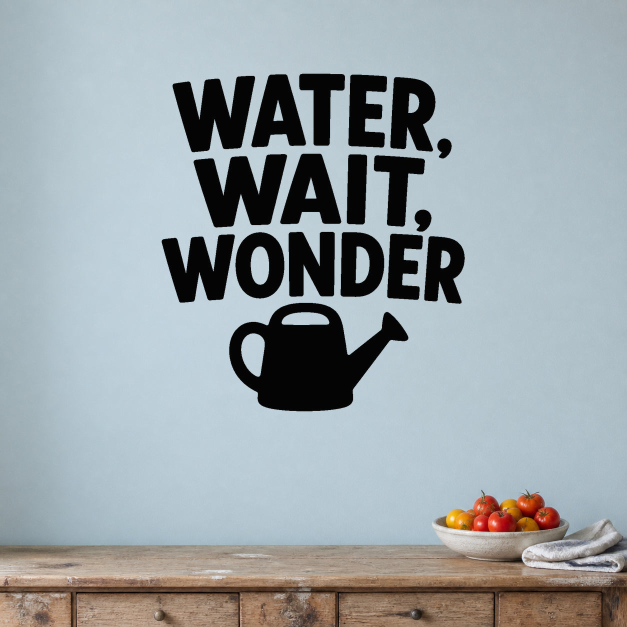 Water, Wait, Wonder removable vinyl wall decal shown in a garden or greenhouse setting.
