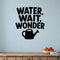 Water, Wait, Wonder removable vinyl wall decal shown in a garden or greenhouse setting.