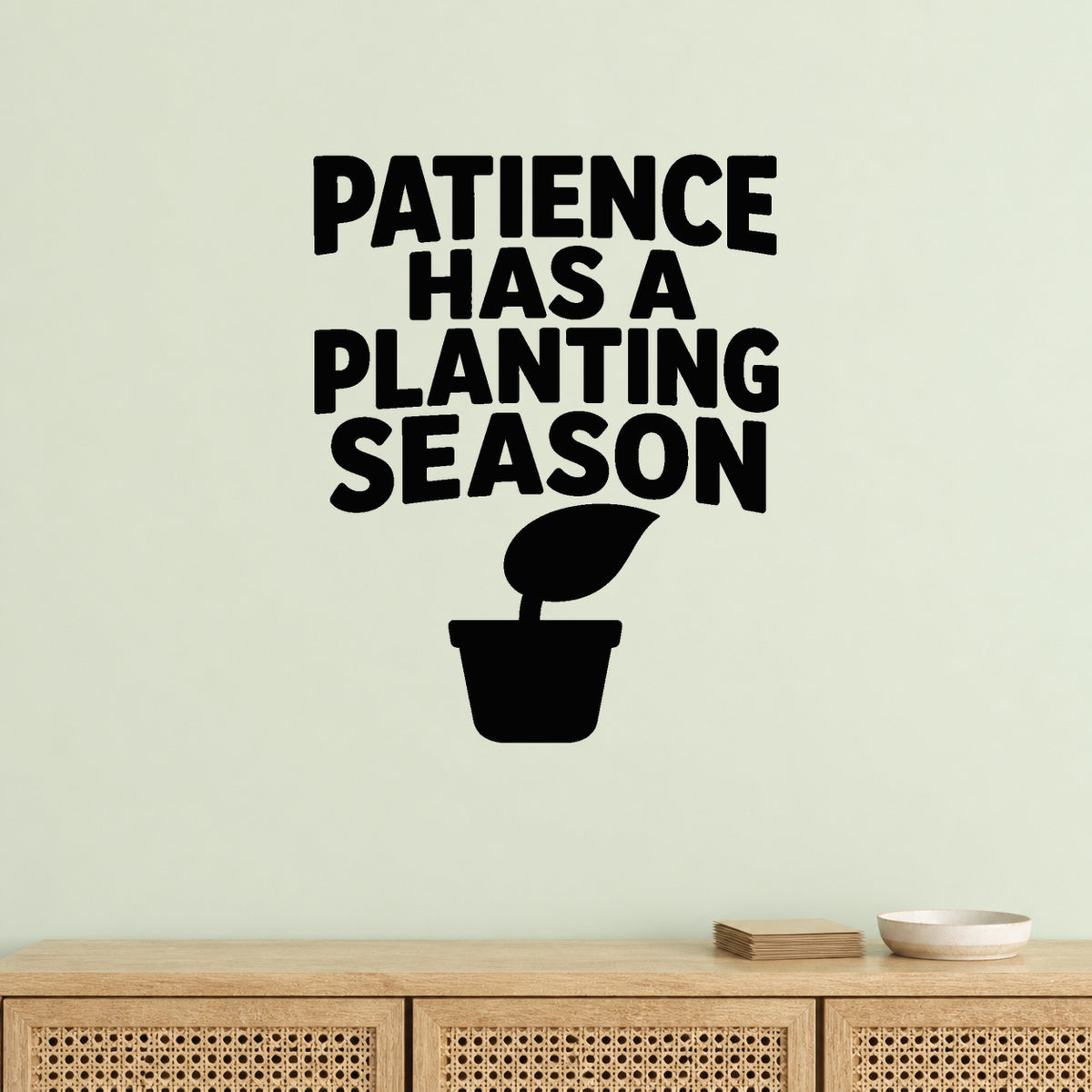 Patience Has a Planting Season removable vinyl wall decal shown in a garden or greenhouse setting.