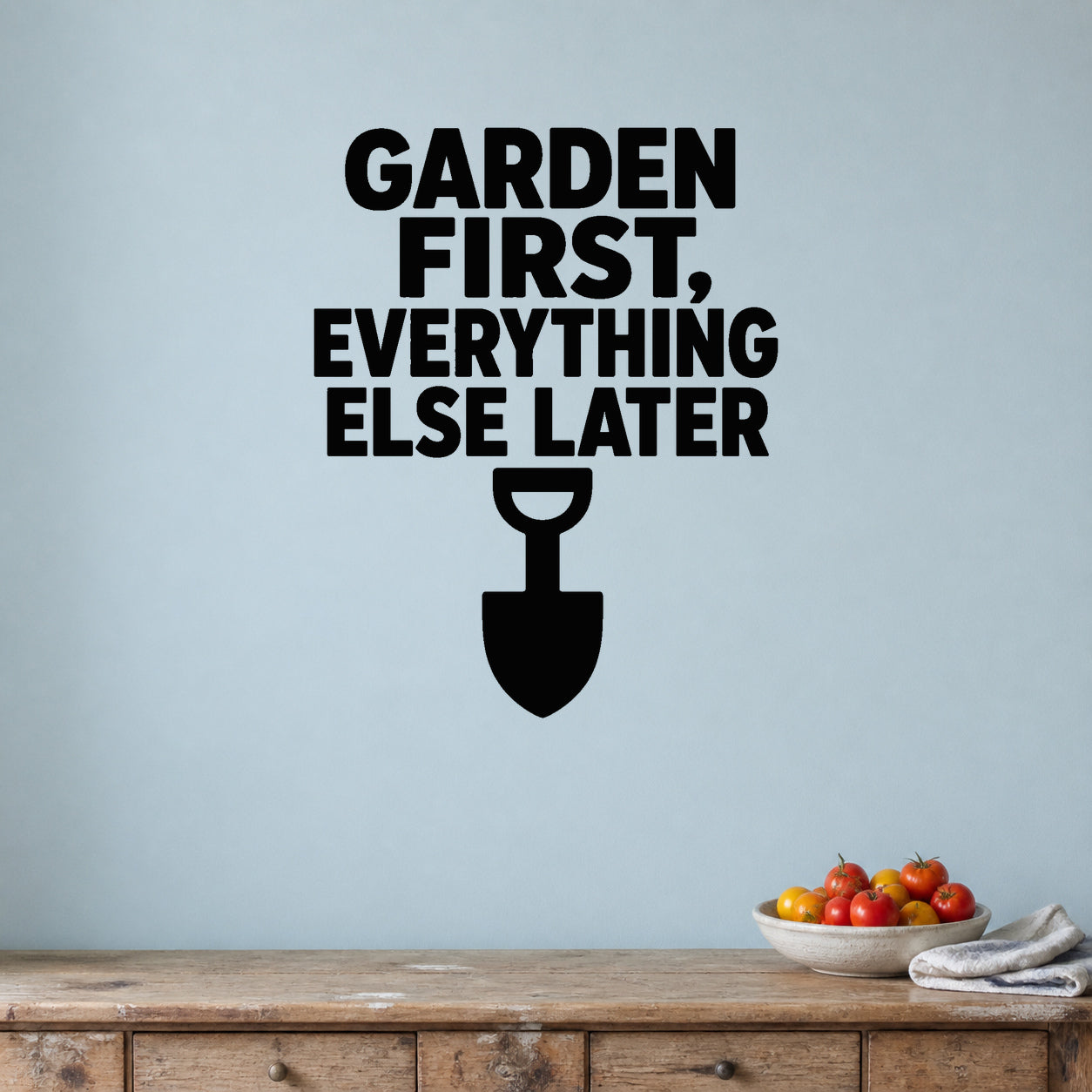 Garden First, Everything Else Later removable vinyl wall decal shown in a garden or greenhouse setting.