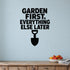 Garden First, Everything Else Later removable vinyl wall decal shown in a garden or greenhouse setting.